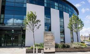 Building with shrubbery outside