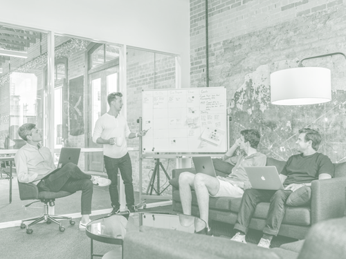 Man Giving Presentation To Group