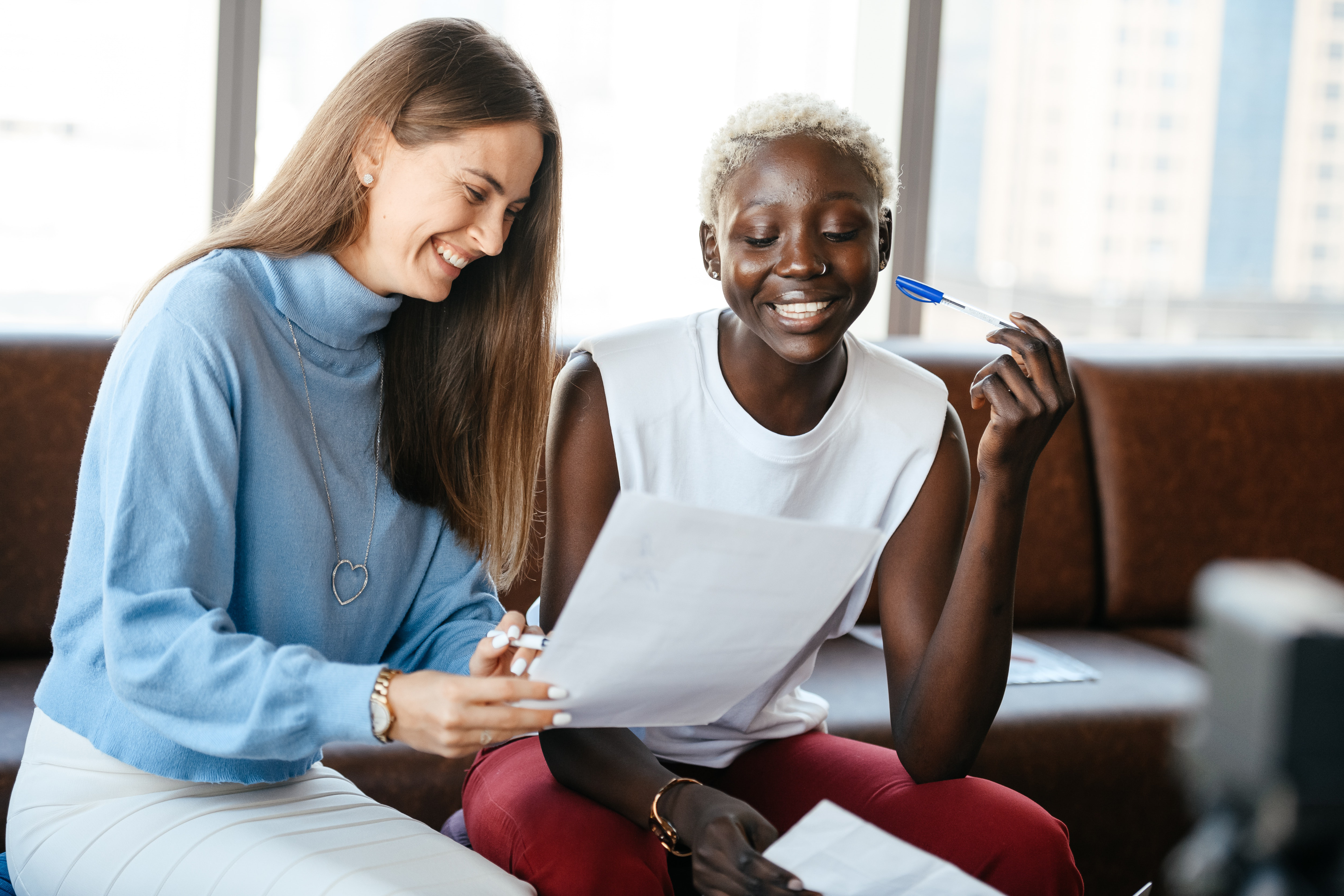 Two women talking and laughing 