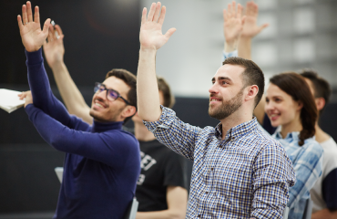 Students With their Hands Up