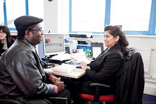 man speaking to careers advisor