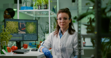 female agritech worker in a lab 