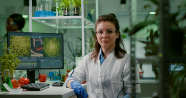 Female Agritech Worker In Lab