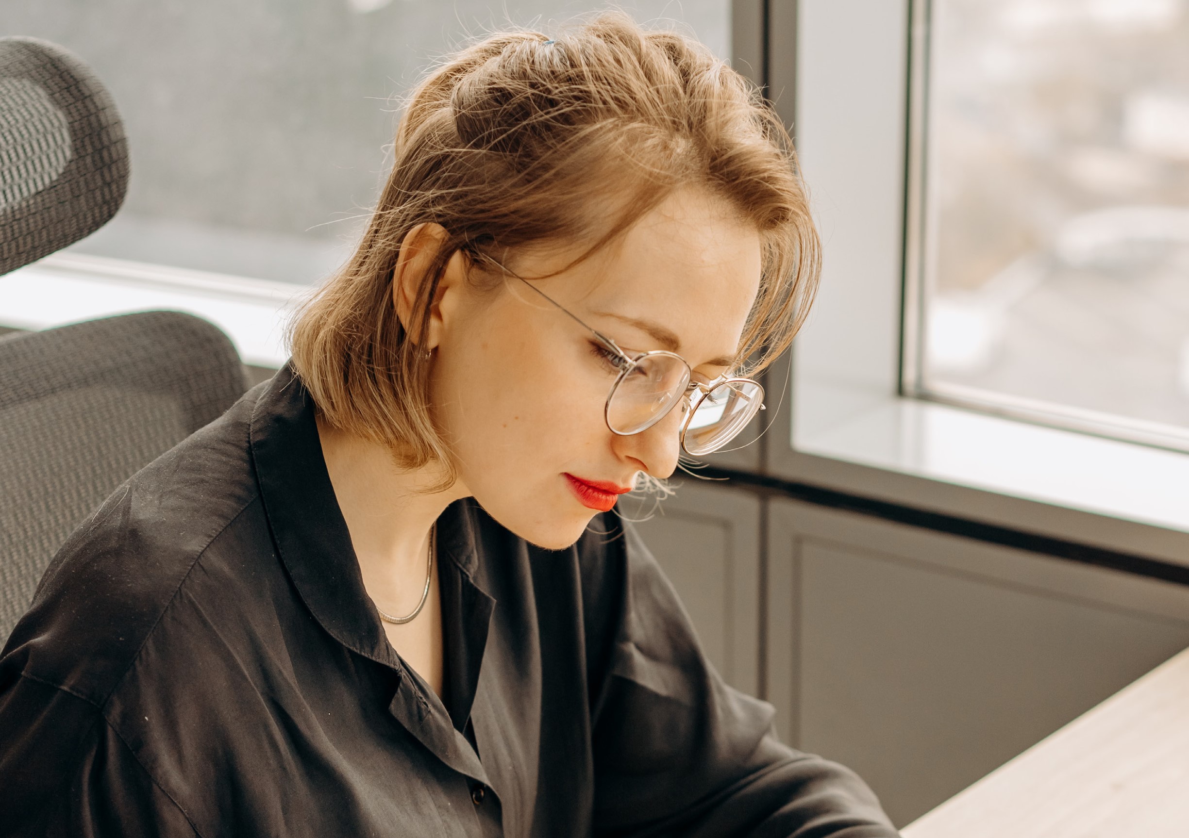 Woman With Glasses