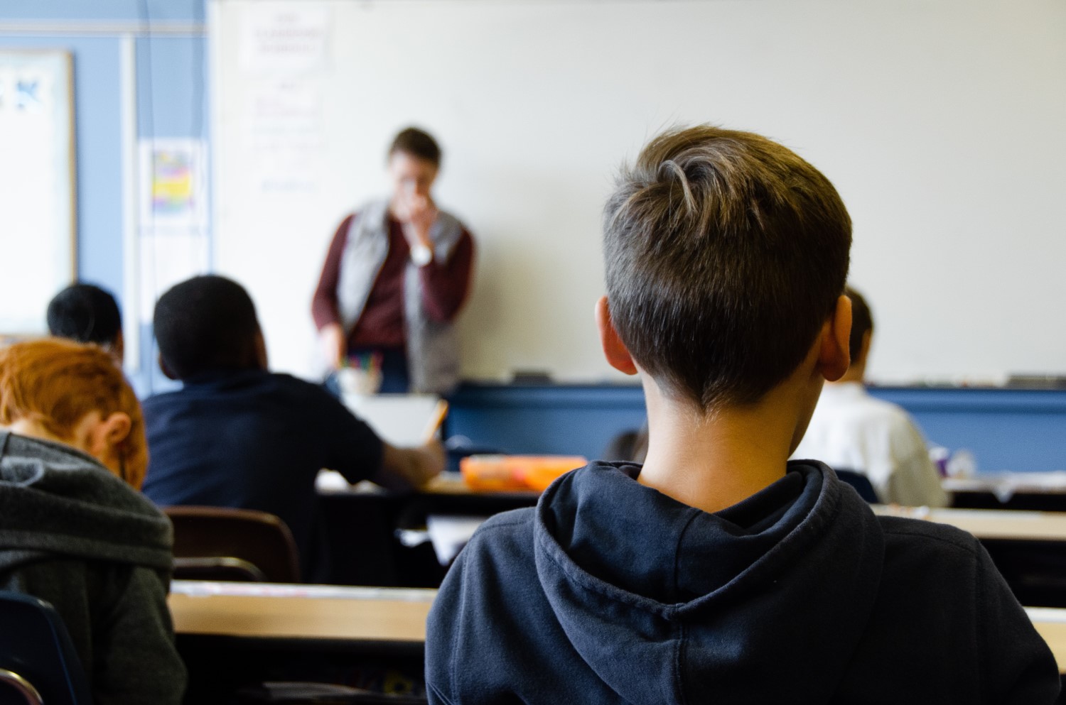 Students at their desks in a classroom