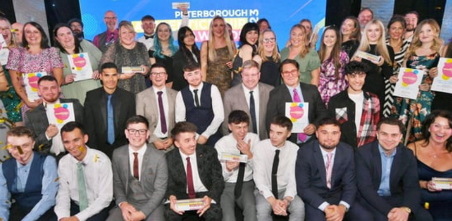 Group of young adults at awards ceremony 