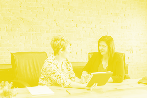 Two women taking during a job interview