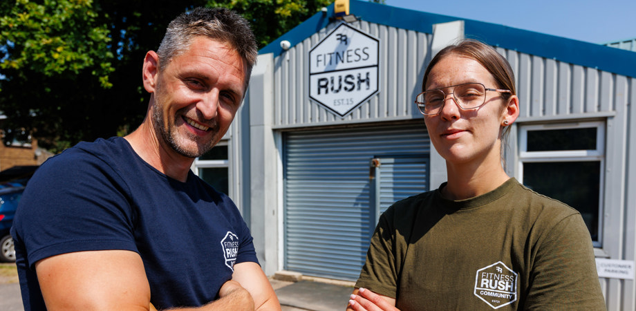 Catherine and Liam standing in front of Fitness Rush 